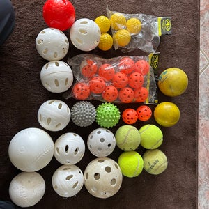 Training balls for baseball softball