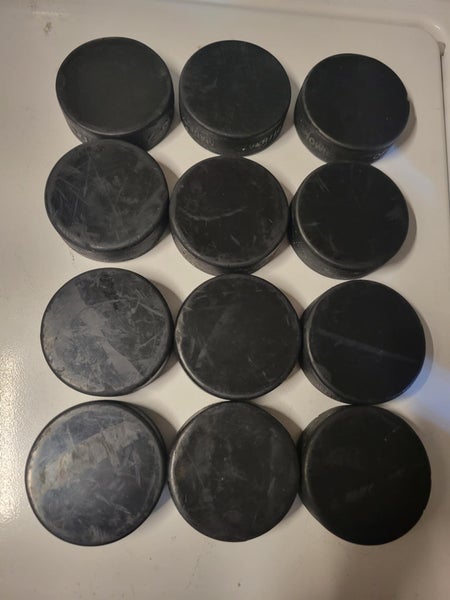 Lot of 12 Blank Black Hockey Pucks Slightly Used