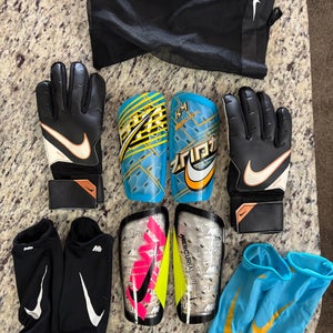 Mercurial shin guards and goal keepers gloves