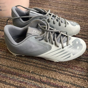 Grey New Balance Cleats