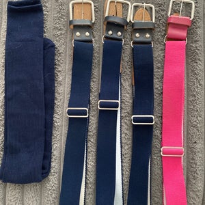 Three. Navy belts, and one navy socks.