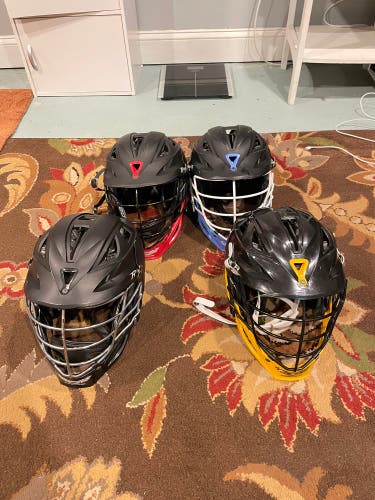 Four Black Cascade R Adult Helmets