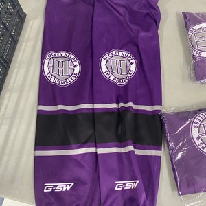 Hockey Helps the Homeless purple socks