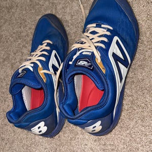 “Used For One Season” New Balance Blue Metal Cleats