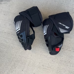 Ccm Hockey Elbow Pads" (new)