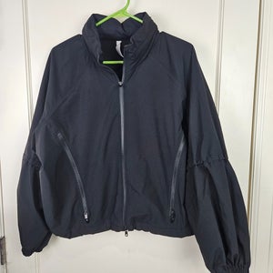 Athleta Stay Fly Windbreaker Jacket Womens M Black Stowable Hood Oversized