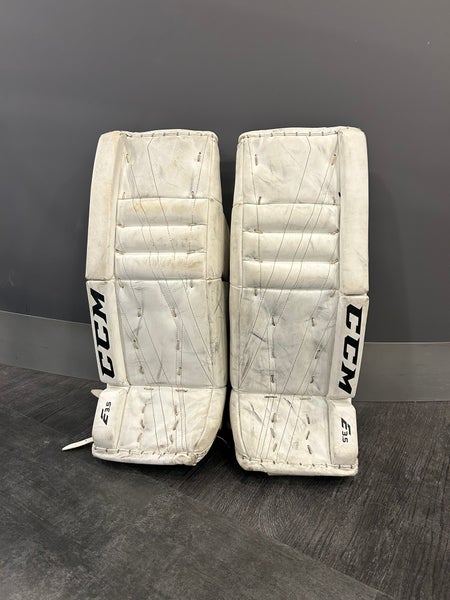 White 24" Youth CCM Extreme Flex E3.5 Goalie Leg Pads (Used)