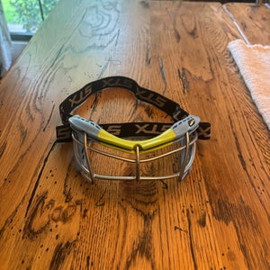 youth sized blue and green STX lacrosse Goggles (used by not alot)