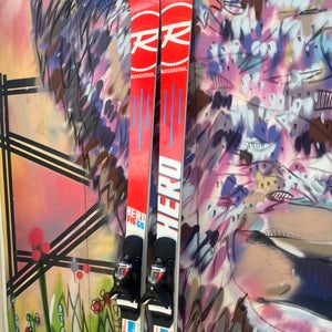 Very lightly used Rossignol Hero FIS GS F-27 Skis equipped with Look SPX 14 System bindings