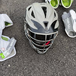 Lacrosse gloves, elbow guards and chest and shoulder pads