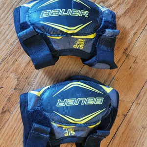 2 elbow pads, shin guards and pants (Used)