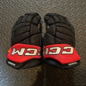 Brand New Northeastern University CCM JetSpeed Pro Stock Gloves Size 14