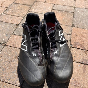 Black Unisex Size M 11.5 (W 12.5) Adult New Balance Low Top Burn X4 Molded Cleats (Used)