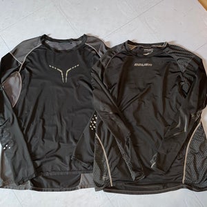 2 Black Large Bauer Compression (Used) 1 Great Shape and 1 Good Shape just little cut on sleeves