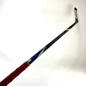 Used Left Blue Bauer Nexus Tracer | 65 Flex P88 Curve Grip | R374