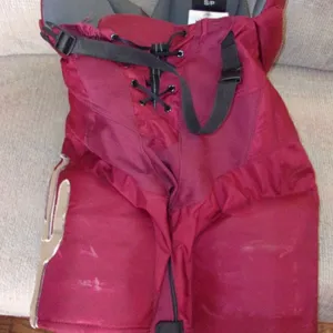 ARIZONA COYOTES Clayton Keller game-worn red Bauer pants from 2022-24 seasons (#9 in waist tag)