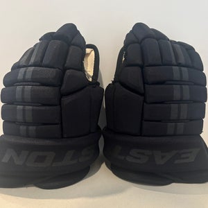 Rare blackout Easton Pro 7. SR, size 13