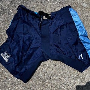 USED BLUE WATERTOWN WOLVES OF THE FPHL HOCKEY PANT COVER UPS SIZE LARGE