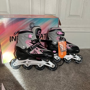 Girls in-line skates adjustable sizes 4-7 NWT