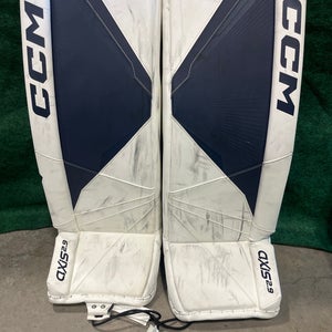 White & Navy Intermediate CCM Axis 2.9 Goalie Leg Pads (Used) | 31”+ 1”