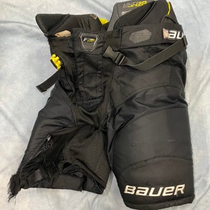 Black Junior Medium Bauer Supreme Ultrasonic Hockey Pants (Used)