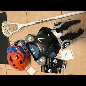 Youth large lacrosse equipment set up. Meets NOCSAE standards