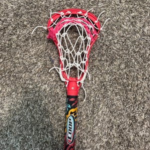 Pool lacrosse stick strung with sidewalk