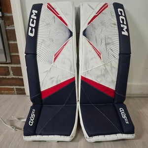 Junior 30"+1" CCM Axis 2.5 Goalie Leg Pads Red, White, and Blue (Used)