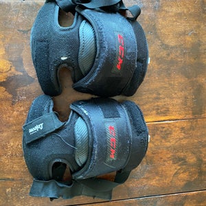 CCM (Used) sr goalie knee guards