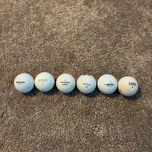 6 assorted golf balls