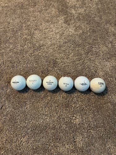 6 assorted golf balls