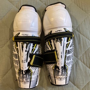 Youth CCM Super Tacks 10" Shin Pads (Used)