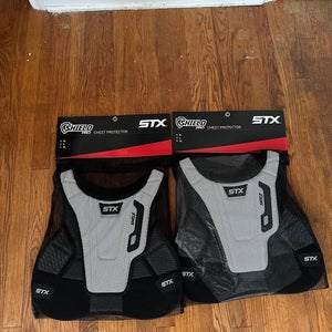 Two New Large STX Shield Pro Chest Protector