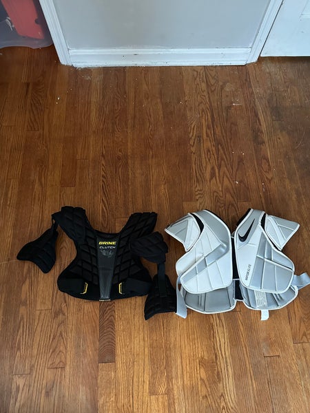 Two Lacrosse Shoulder Pads