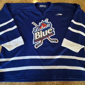 Vintage Labatt Blue Beer Stitched Bauer Hockey Jersey. Size: XL