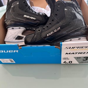 Bauer Supreme Matrix Hockey Skates Size 4 (Used)
