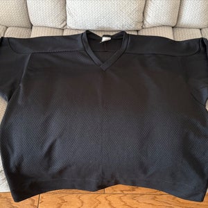 Two Hockey Practice Jerseys Black / White Pair Senior Size 2X = Modern XL (Used)