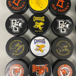 NCAA New Pucks - over 125 available