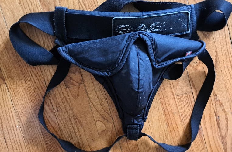 Eagle Senior hockey goalie Jock with a cup (Used)