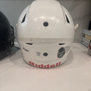White helmet is Riddell large Youth