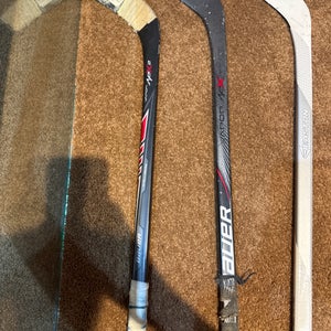 5 Mini hockey(knee) sticks. All lefty.