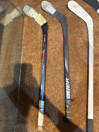 5 Mini hockey(knee) sticks. All lefty.