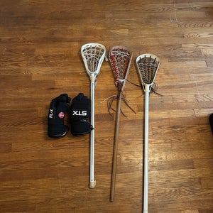 Three Vintage Lacrosse Sticks With Vintage STX Lacrosse Gloves
