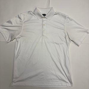 Greg Norman white polo