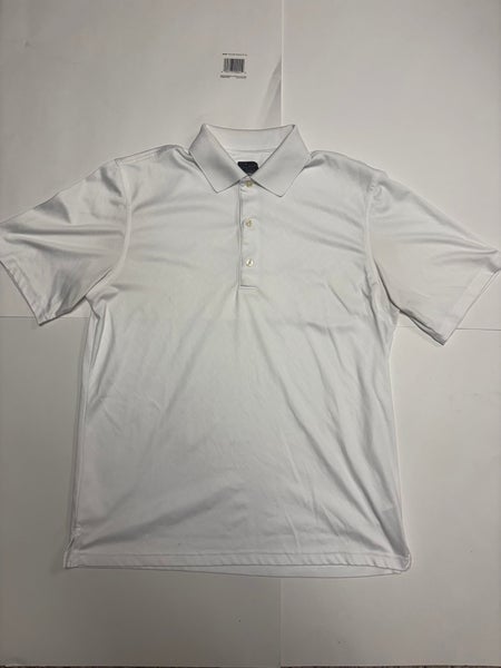 Greg Norman white polo