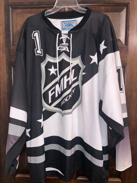 USED BLACK AND WHITE FMHL #1 HOCKEY JERSEY SIZE 56