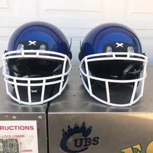 2 USED XENITH X2E+ ADULT FOOTBALL HELMETS - LARGE  - ROYAL BLUE METALLIC