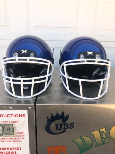 2 USED XENITH X2E+ ADULT FOOTBALL HELMETS - LARGE  - ROYAL BLUE METALLIC