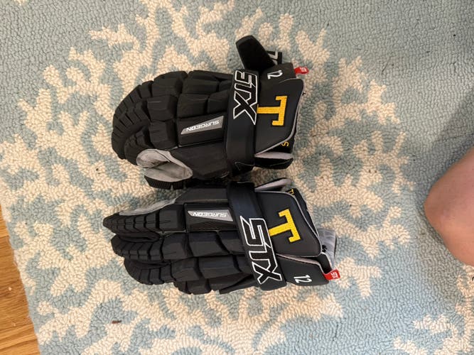 Towson used STX lacrosse gloves