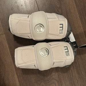 New white Melrick lacrosse, elbow pads large